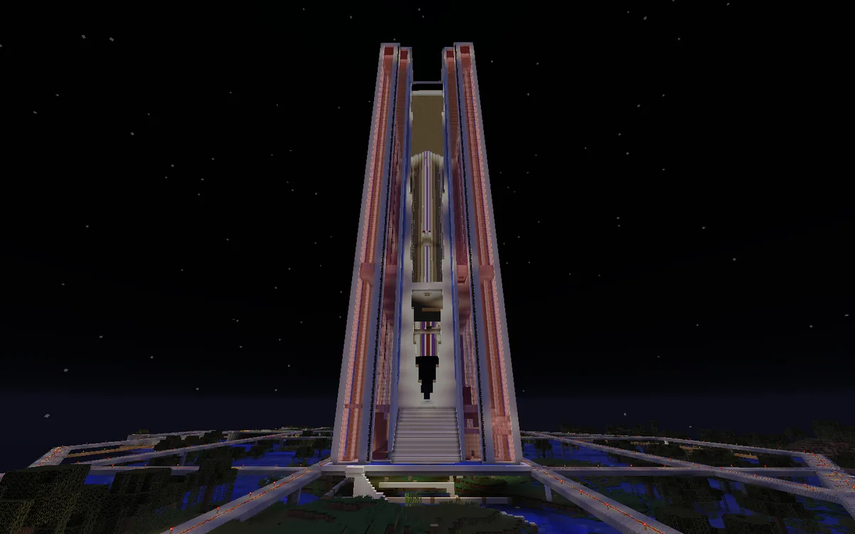 The landmark gradient tower of Bohemian Grove — a tall building faced with a red-through-purple color gradient, the city's signature structure.